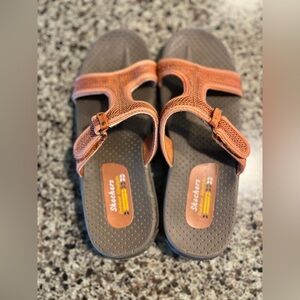 Skechers Size 9 orange and coral color.